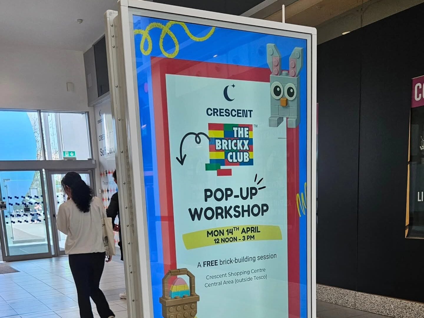 Services Image of a digital poster in the Crescent Shopping Centre